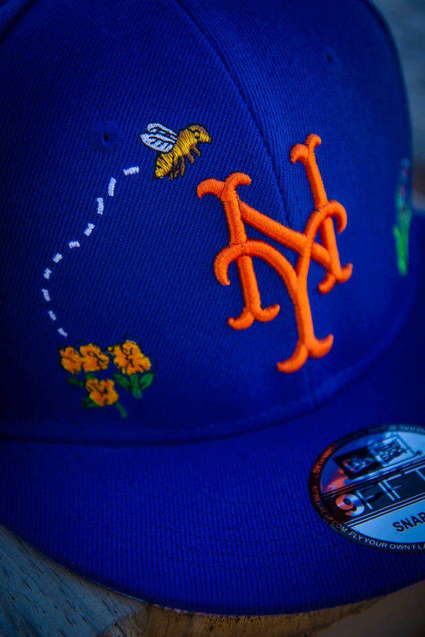 New York Mets Bee Spring Floral 9Fifty New Era Fits Snapback Hat New Era Fits Hats New York Mets Bee Spring Floral 9Fifty New Era Fits Snapback Hat New York Mets Bee Spring Floral 9Fifty New Era Fits Snapback Hat - Devious Elements Apparel