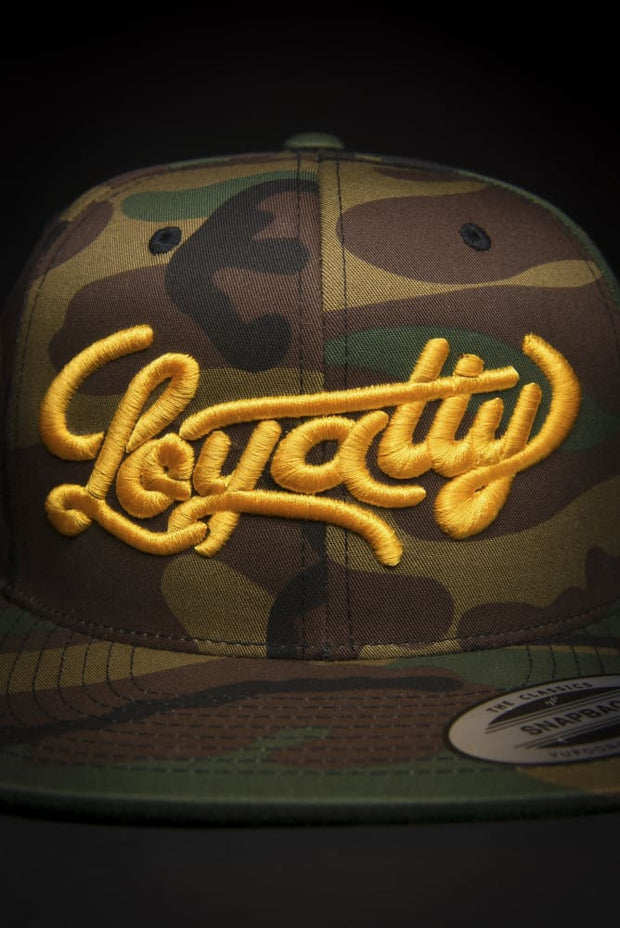Loyalty Stunner Camo Gold Snapback Hat Loyalty hat Loyalty Stunner Camo Gold Snapback Hat Loyalty Stunner Camo Gold Snapback Hat - Devious Elements Apparel