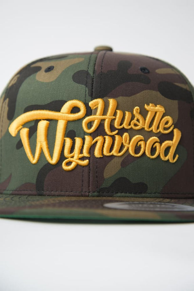 Hustle Wynwood Graffiti Gold Camo Snapback Hat Hustle Wynwood hat Hustle Wynwood Graffiti Gold Camo Snapback Hat Hustle Wynwood Graffiti Gold Camo Snapback Hat - Devious Elements Apparel
