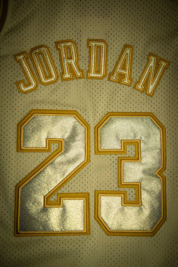 white and gold bulls jersey