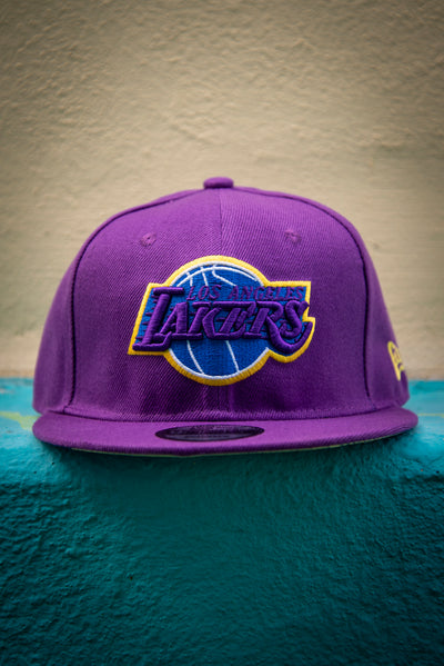 Los Angeles Lakers Hollywood Purple 9Fifty New Era Fits Snapback Hat New Era Fits Hats Los Angeles Lakers Hollywood Purple 9Fifty New Era Fits Snapback Hat Los Angeles Lakers Hollywood Purple 9Fifty New Era Fits Snapback Hat - Devious Elements Apparel