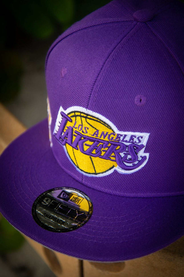 Los Angeles Lakers Side Flow 9Fifty New Era Fits Snapback Hat New Era Fits Hats Los Angeles Lakers Side Flow 9Fifty New Era Fits Snapback Hat Los Angeles Lakers Side Flow 9Fifty New Era Fits Snapback Hat - Devious Elements Apparel